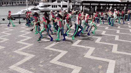 OpenPose demo: skeletons drawn on dancing people